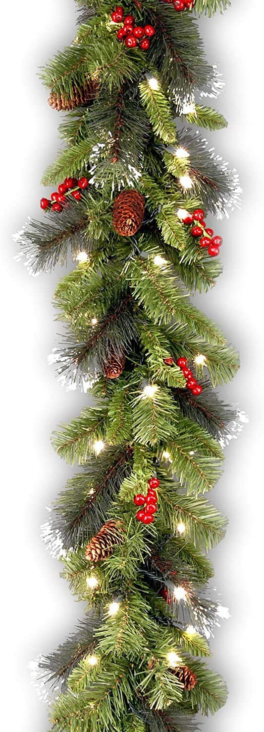 Artificial Christmas Garland, Green, Crestwood Spruce, White Lights, Decorated with Pine Cones, Berry Clusters, Plug In, Christmas Collection, 9 Feet