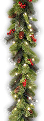 Artificial Christmas Garland, Green, Crestwood Spruce, White Lights, Decorated with Pine Cones, Berry Clusters, Plug In, Christmas Collection, 9 Feet