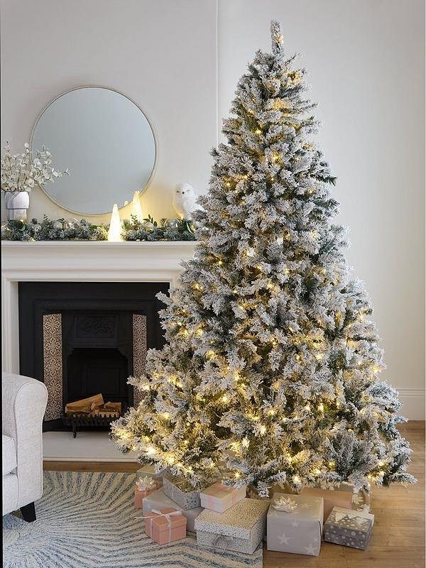 Pre-lit Christmas tree with holiday lights