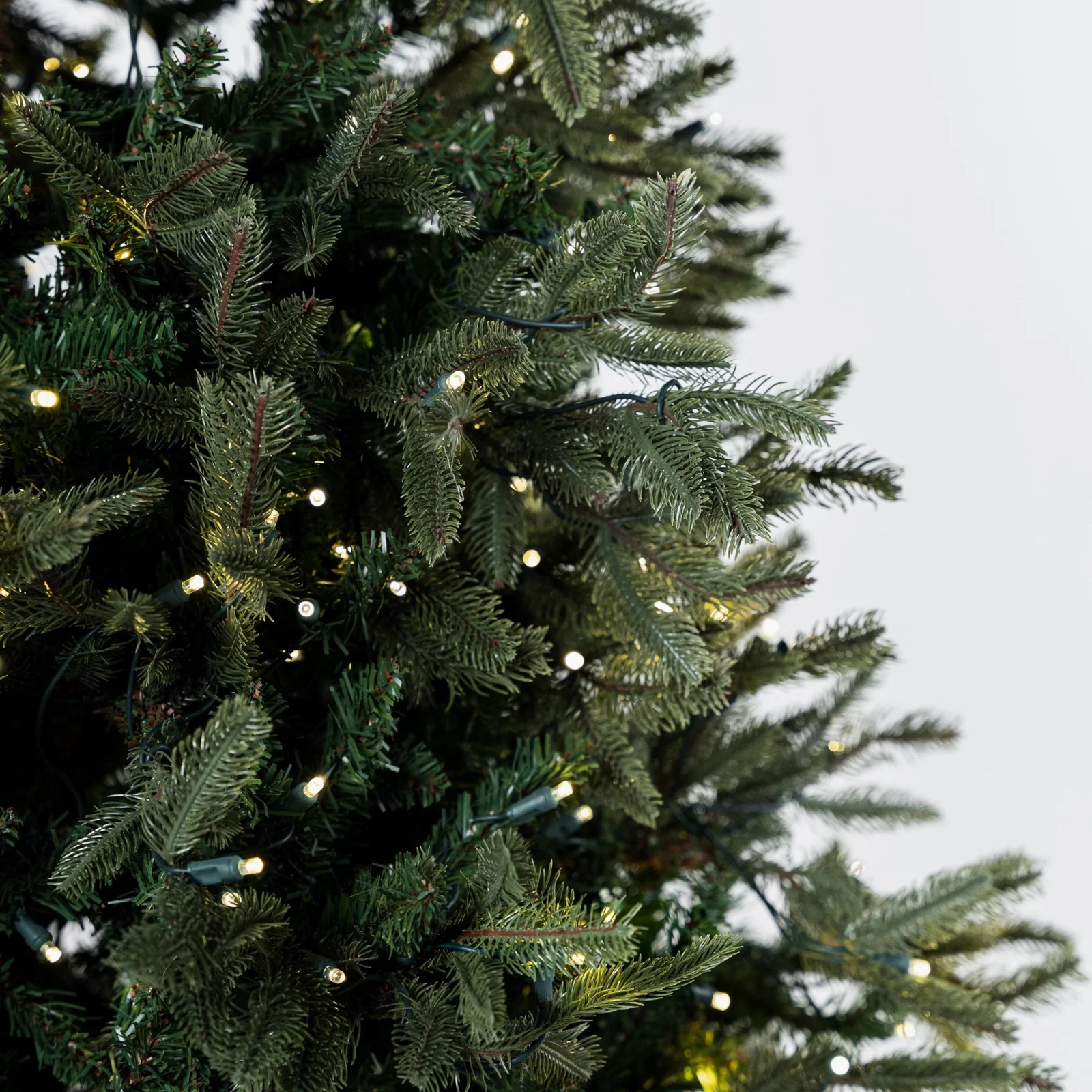 7.5 ft pre-lit Fraser Fir Christmas tree with warm white LED lights