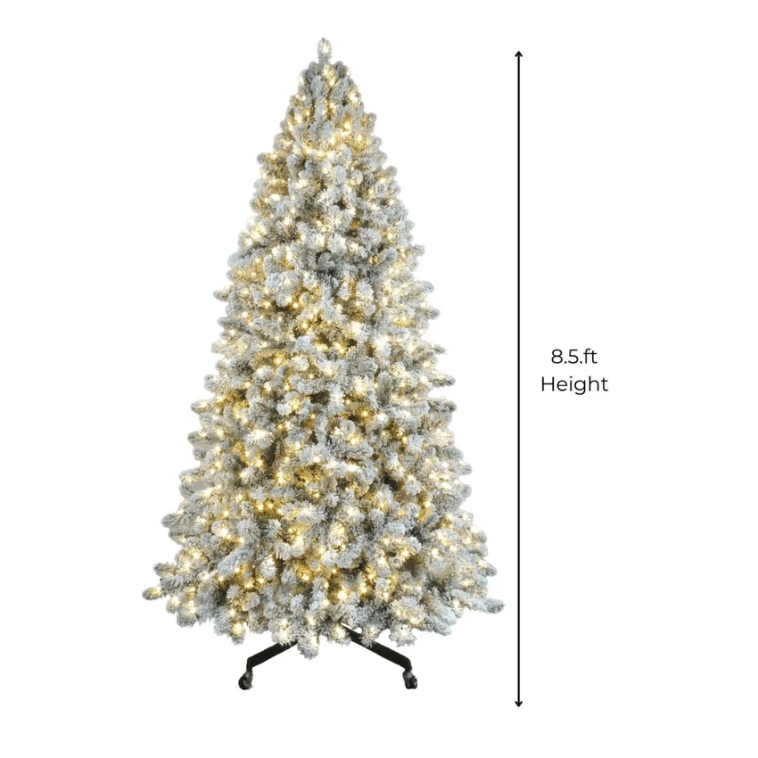 8.5 ft pre-lit flocked Christmas tree with 900 warm white LED lights
